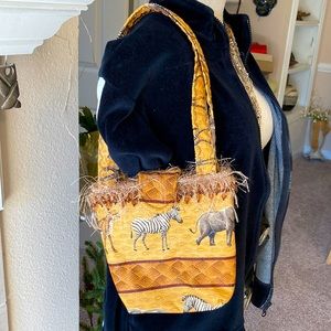 Animal intrigue shoulder bag.  Grab and go in style